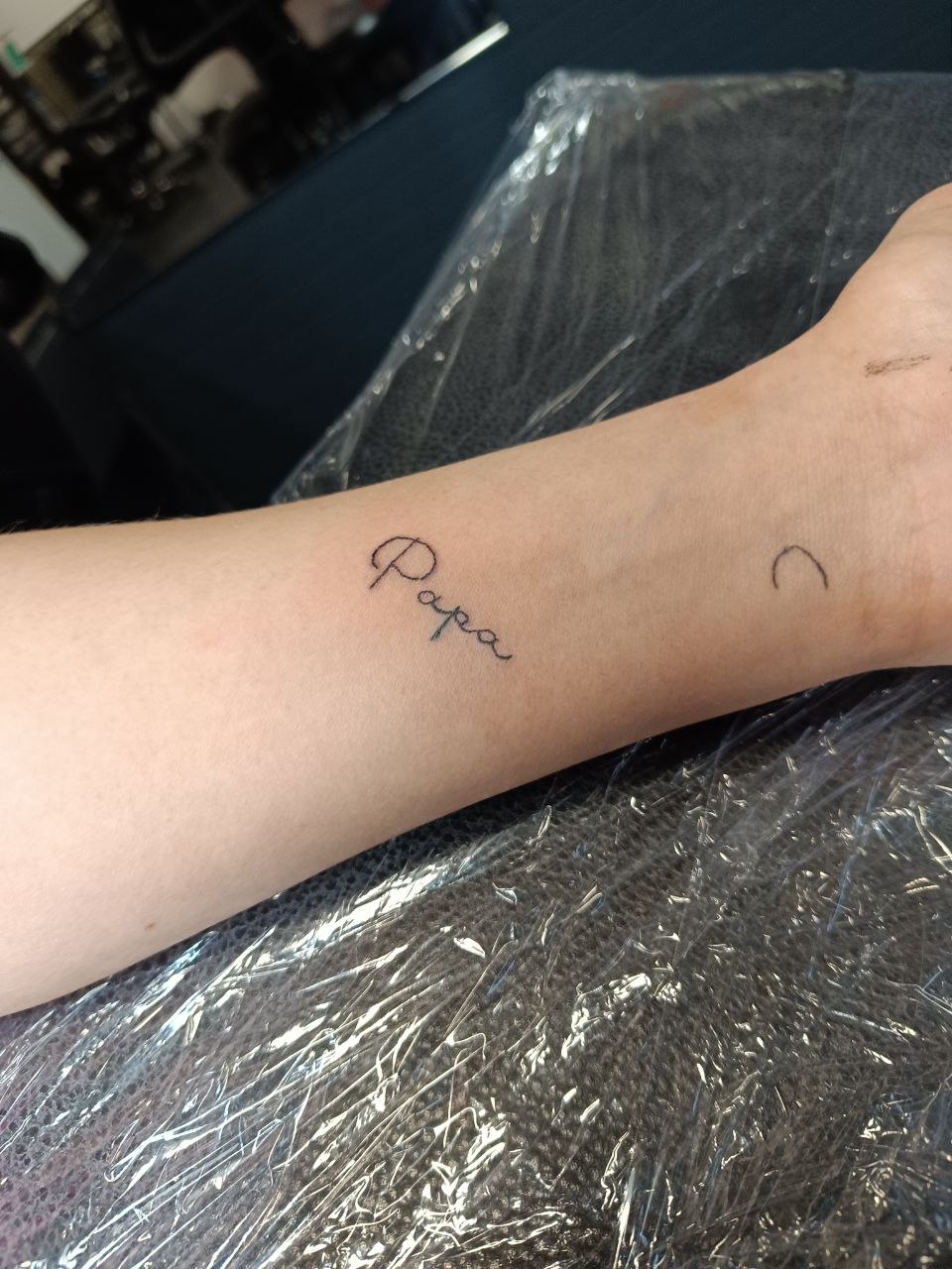 Schriftzug Tattoo auf dem Unterarm