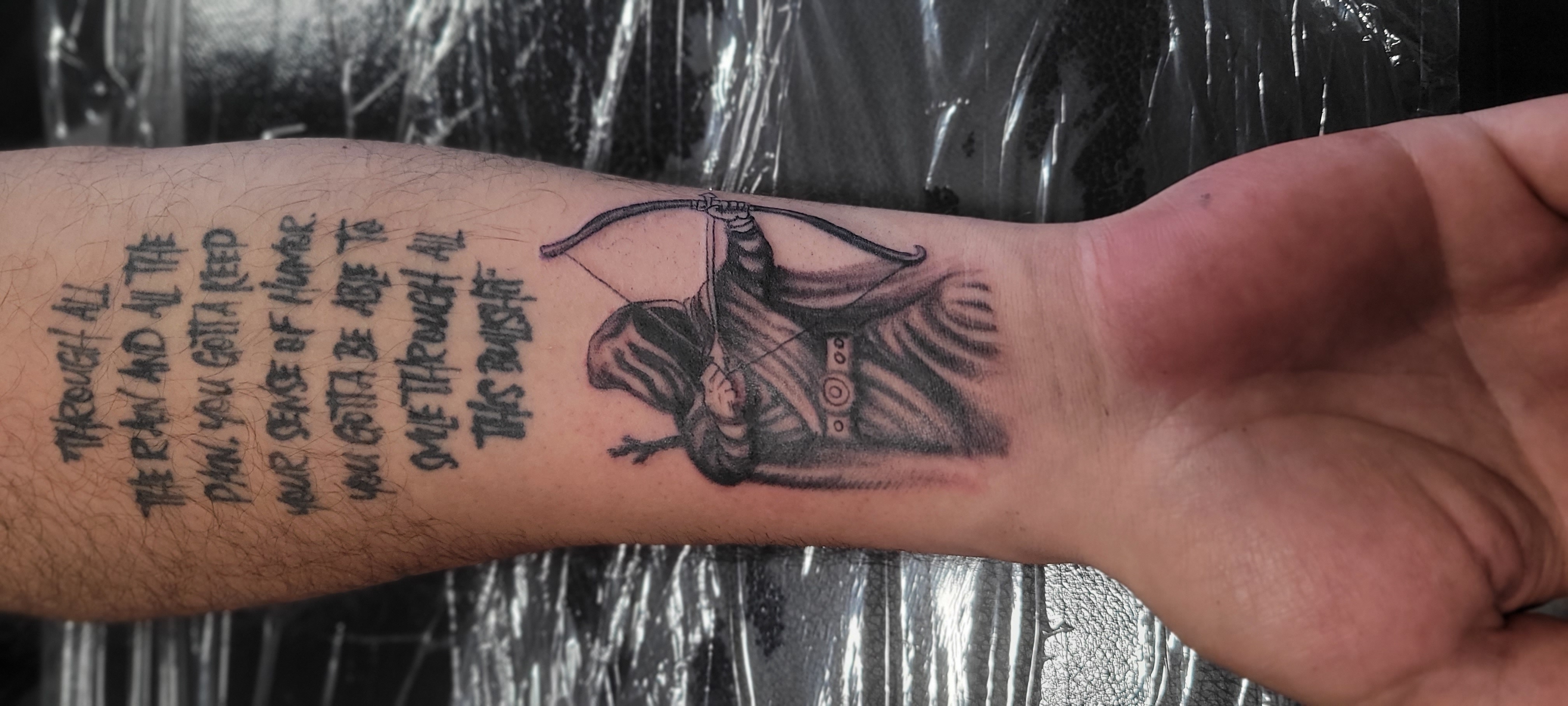 Tattoo von einem Bogenschützen