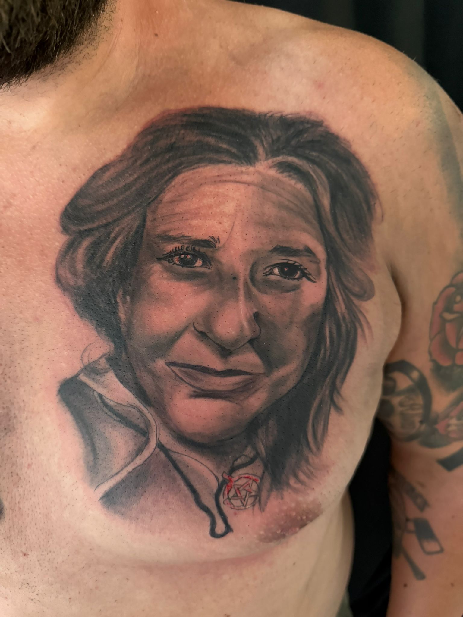Tattoo von einem menschlichen Portrait