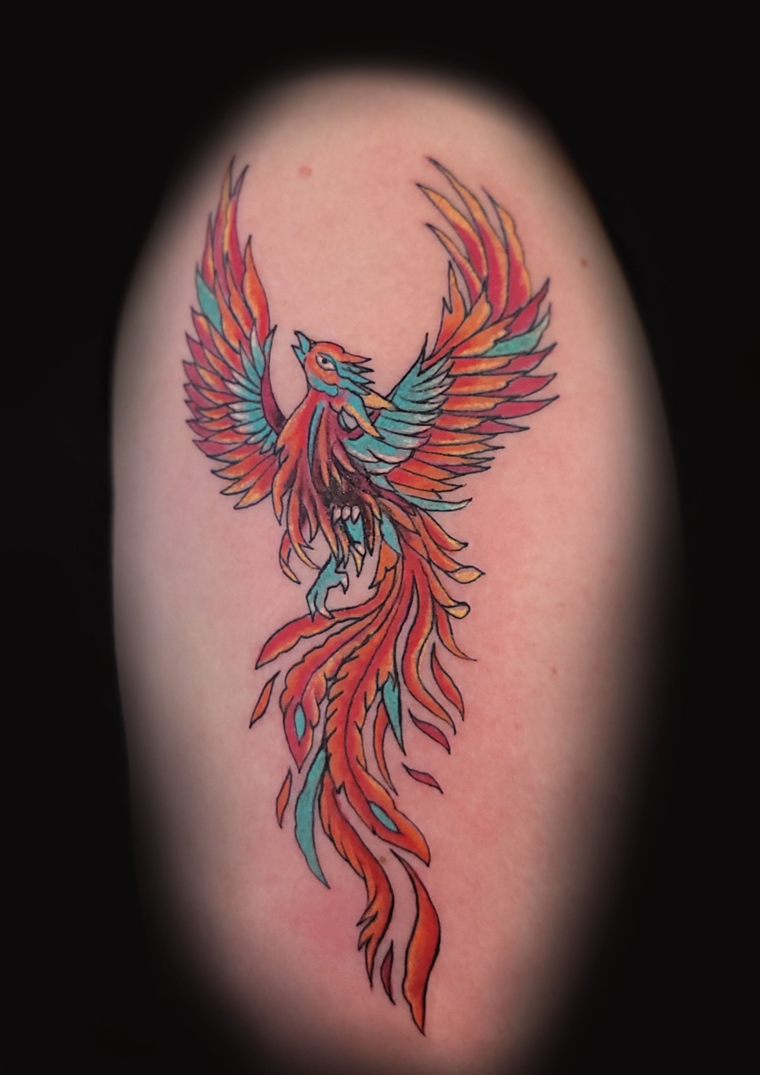 Tattoo von einem Phönix in bunt